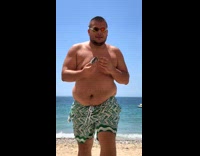 Guy pulls fish out of pocket