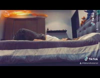 Girl lays on back friend body roll 