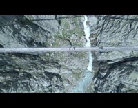 People on trift bridge Drone shot ascend