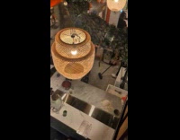 Employees sweep away flood inside of shop.