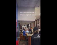 Bunch of college guys gather to finish dining hall cereal 
