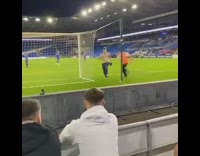 Streaking fan at football game gets tackled by guards