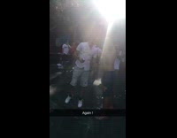 shirtless guy and guy in white shirt drinking beer