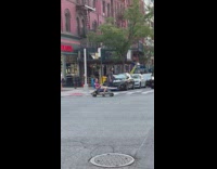 Guy sitting on blue motorized lawn chair