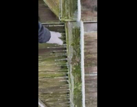 man makes music by breaking icicles 