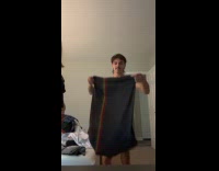 Woman shows how boyfriend wears shirt