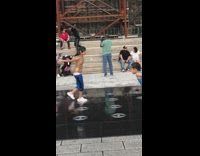 Guy black shirt foot dance stairs fountain