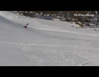 Skier does flip spin off big ramp and lands perfectly on slope, then trips and face plants into snow