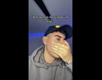 Guy raps to eminem song behind hand 