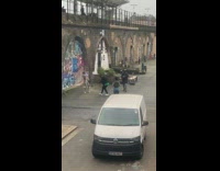 Graffiti wall short hair grey body suit dance 