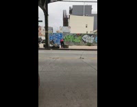 Red sweater guy knocks over ATM machine 