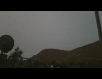 Lightning strike crawls on the cloudy sky