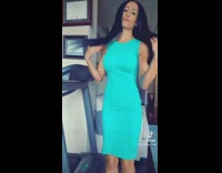 Lady wearing sweatpants changes into blue dress 