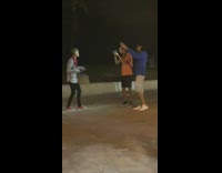 Guy films music video on busy rooftop