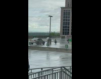 Woman underwear hold umbrella jump continuously parking rooftop