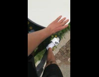 Guy pretends to poop at discarded sidewalk toilet