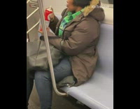 Lady sprays whipped cream directly in mouth 