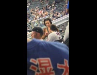 Collab WINY - Woman braid hair of man baseball stadium