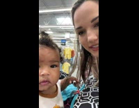 Baby in cart wants coffee 