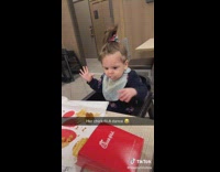 Toddler dances while eating chick fil a