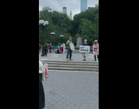 Drama scene happens next to protesters 