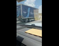 Men sees truck transporting vibrator products