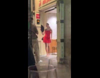 Woman red dress with fan entrance photoshoot