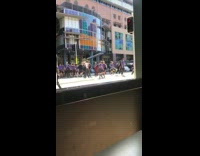 Guy checkered sleeves pants dance students street