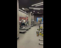 Chicken song music played on the television inside the gym