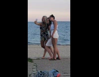 Three girls selfie beach sunset white dress 