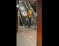 Guy stretches leg on bars at subway Part 1 