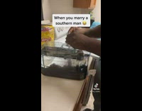 Southern man fills dispenser up with kool aid 