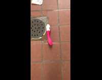 Collab WINY - Activated pink vibrator on the bathroom floor