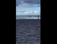 Woman in bikini walked around the beach