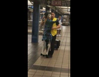 Collab Subway Creatures - Man yellow vest dances with skeleton at subway