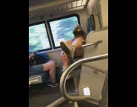 girl who looks naked asleep on train 