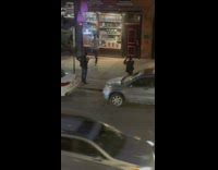 Guy pose beside wine display glass night part 1