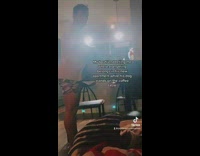 Guy scolds his girlfriend while his dog is on the table