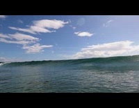 POV getting under waves ocean high fps