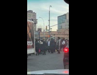 Crowd gathers to celebrate Purim on street