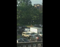 Black shorts girl steps up down curb 