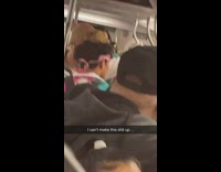 Man rides subway with brown animal on head 