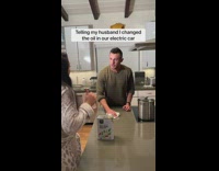 Woman tells her husband she out oil in tesla