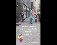 Brown sloth blue unicorn costume dance sidewalk