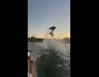 Guy backflip on black jet ski success 