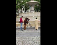 Guy in blow up inflatable suit getting ready for photo