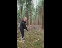 Man with a backpack golf at the forest in Slow Motion Part 2