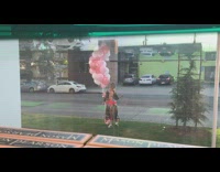 Girl dances on sidewalk alone