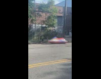 Jet ski parked on sidewalk 