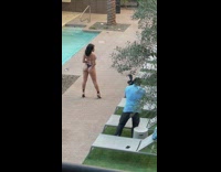 Woman thong bikini butt cheeks beside pool